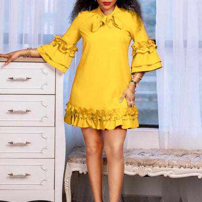 Bow-Neck Tunic Dress with Ruffled Hem and Cuffs